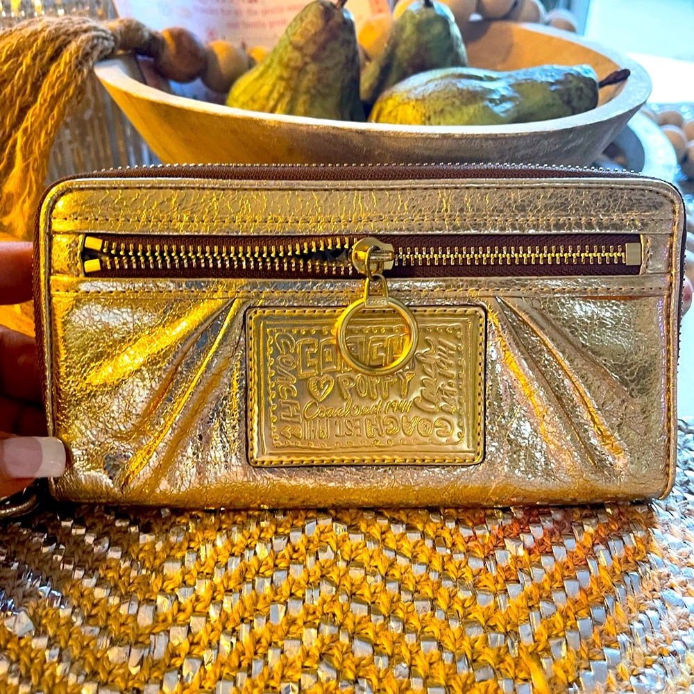 Coach Poppy wallet/ wristlet crinkle gold metallic zip top and front.